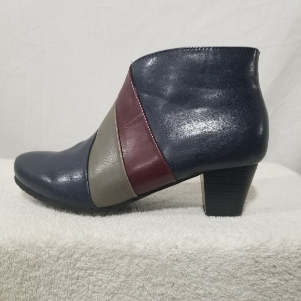 Wonderlust angle heeled boots